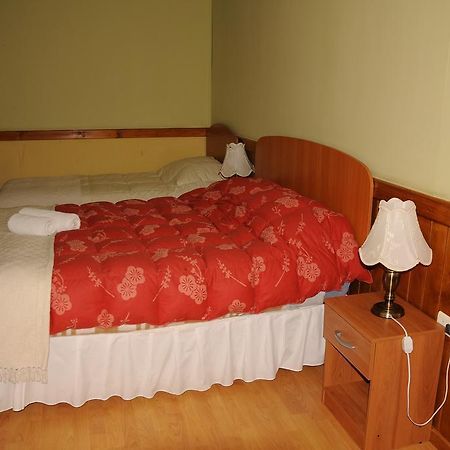 Hostal El Rincon Puerto Natales Bagian luar foto
